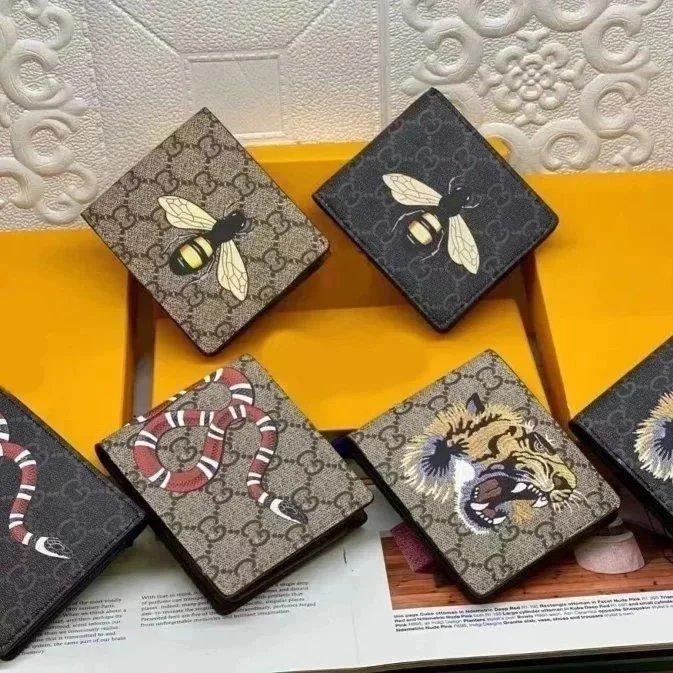 Gucci Printed Canvas Wallets
